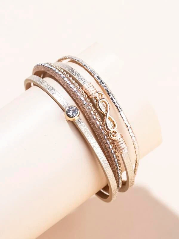 Brazalete a capas Infinity Dorado