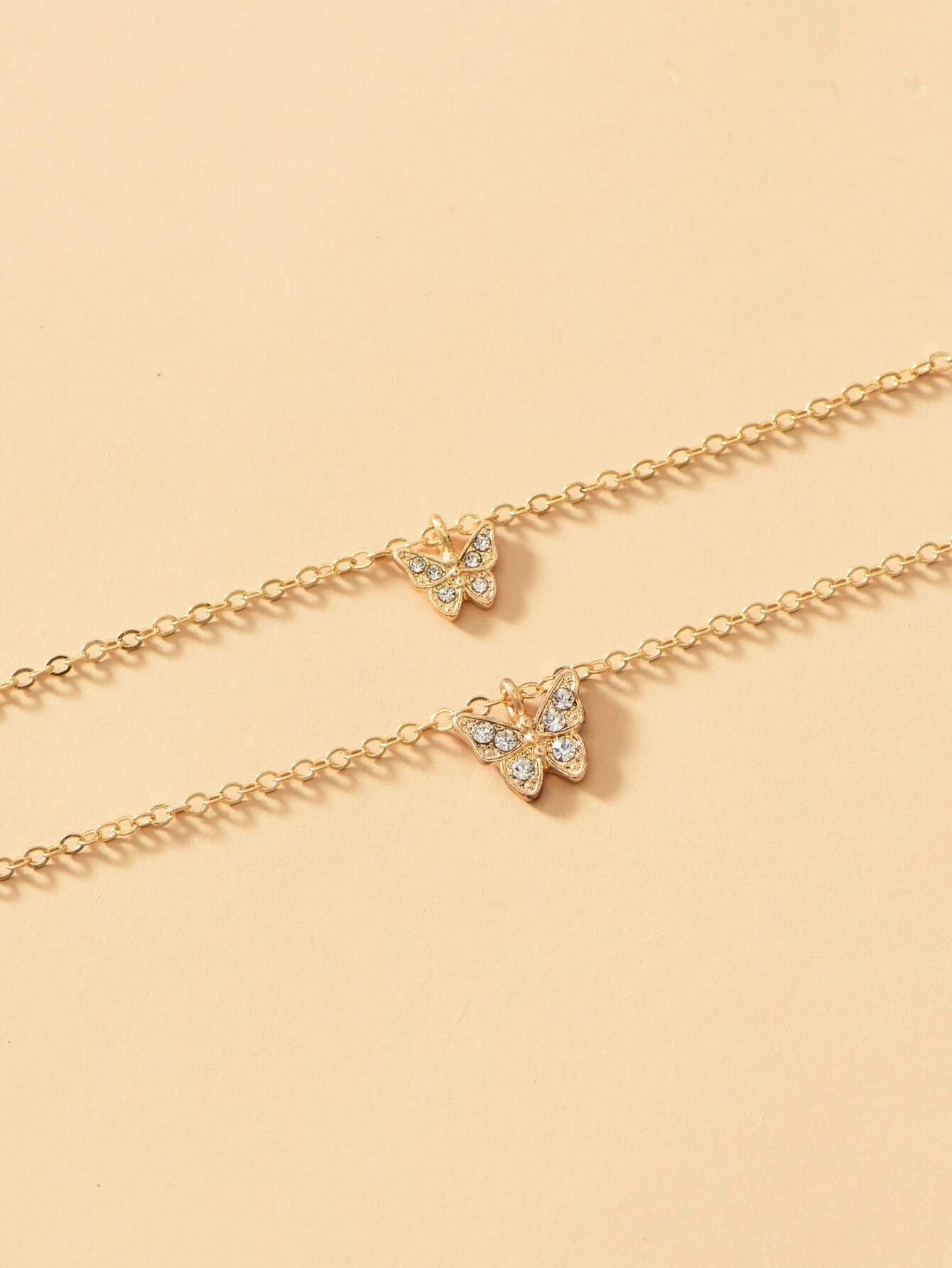 Collar doble Dorado y Plateado con dijes de mariposa