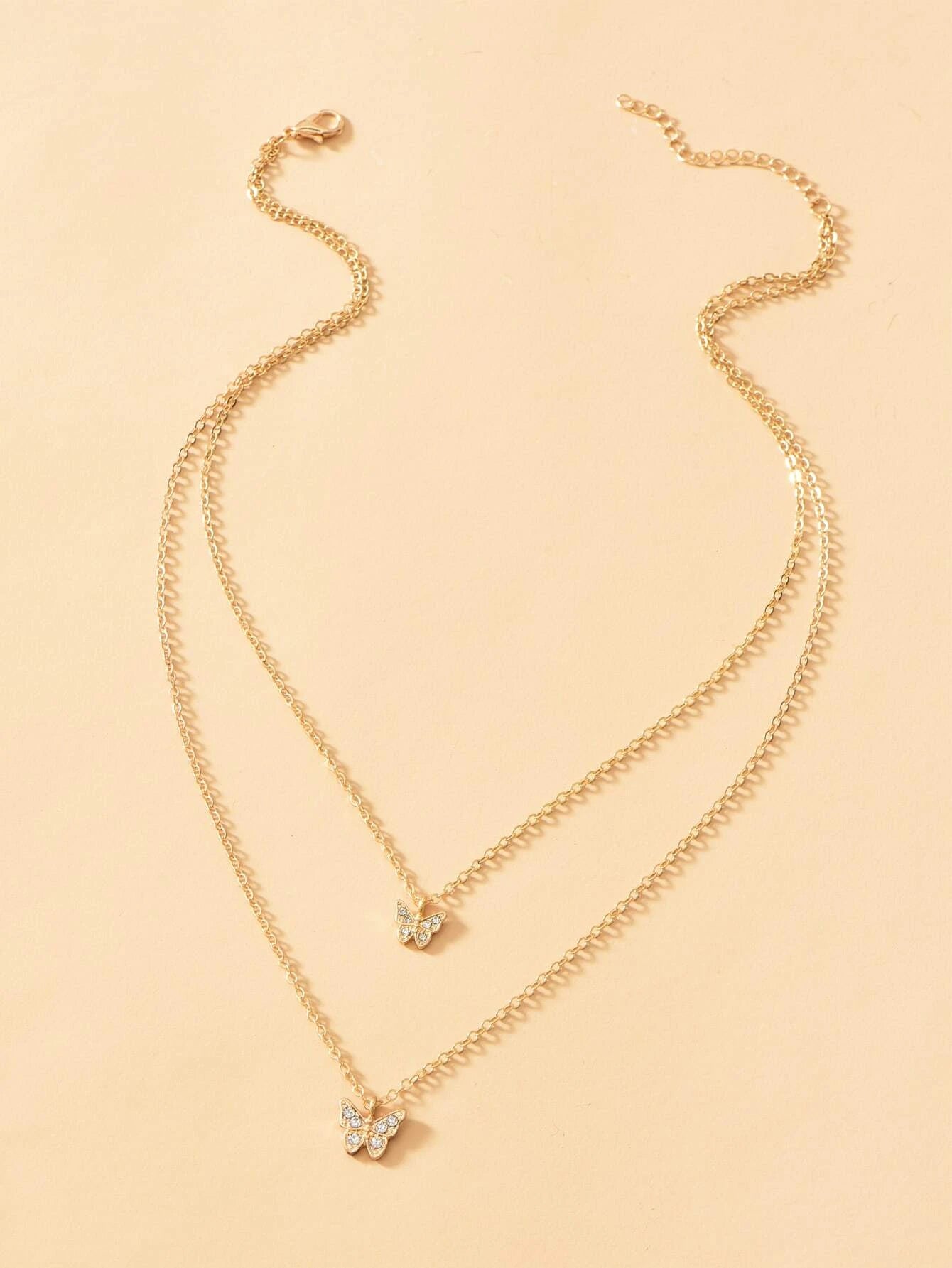 Collar doble Dorado y Plateado con dijes de mariposa