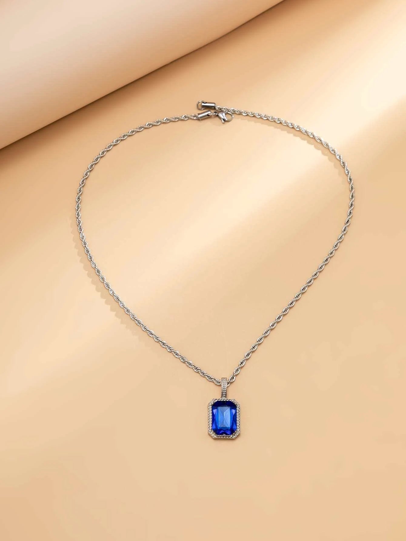 Collar plateado con dije de piedra azul en acero inoxidable