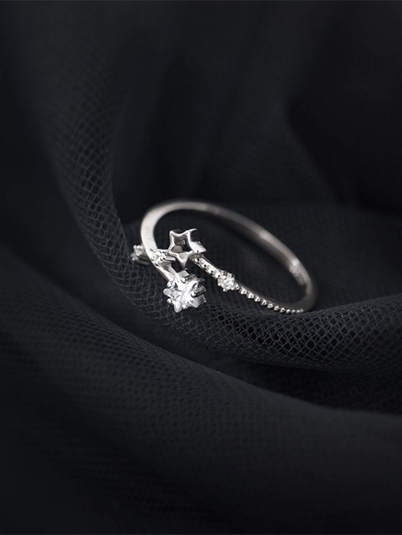 Anillo de plata 925 con detalle de estrella ajustable