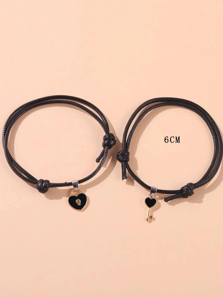 Pulsera de pareja con accesorio de clave y corazón