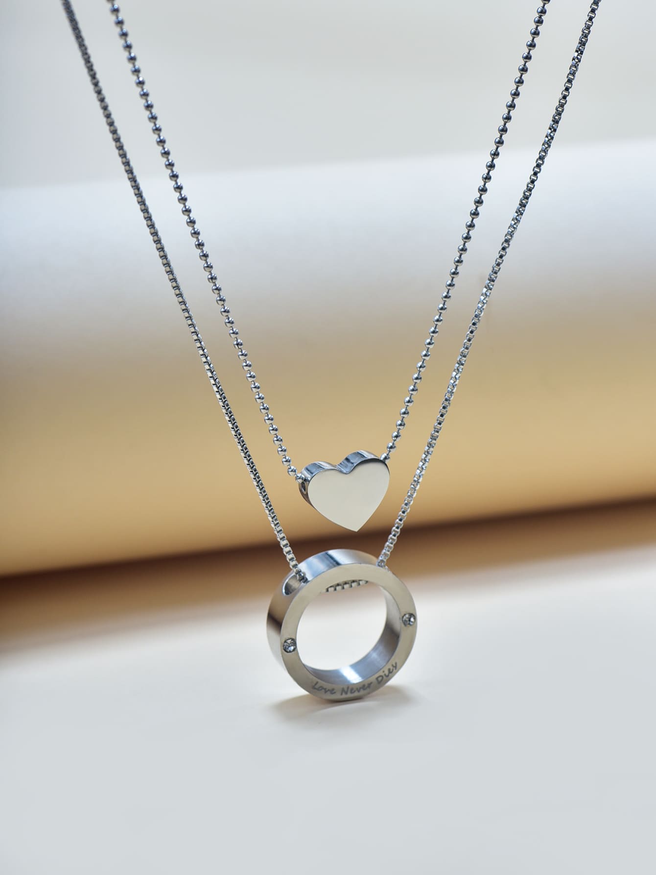 Collar de Corazón y aro en Acero Inoxidable Plateado