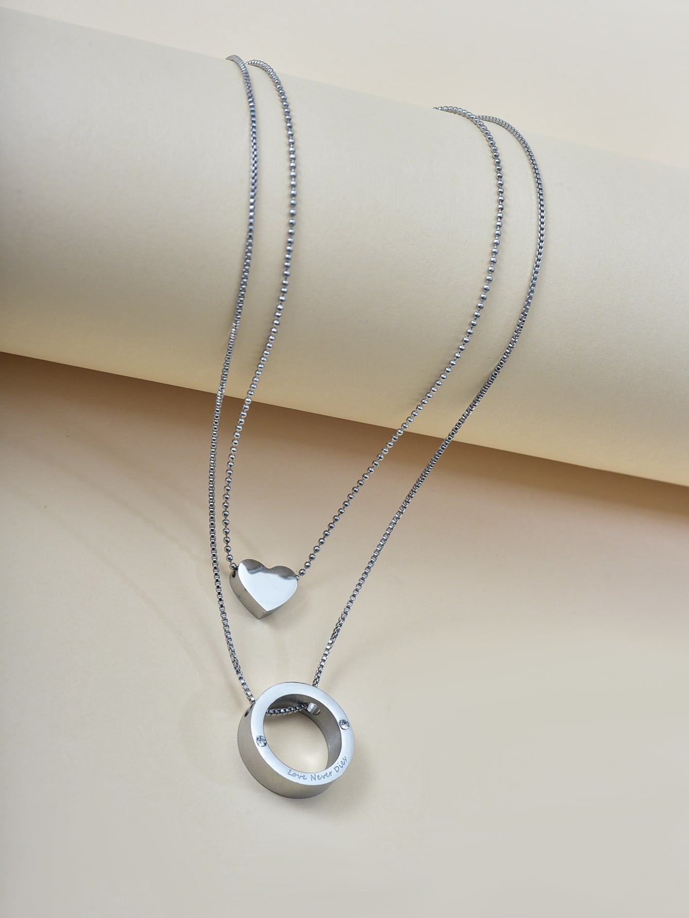 Collar de Corazón y aro en Acero Inoxidable Plateado