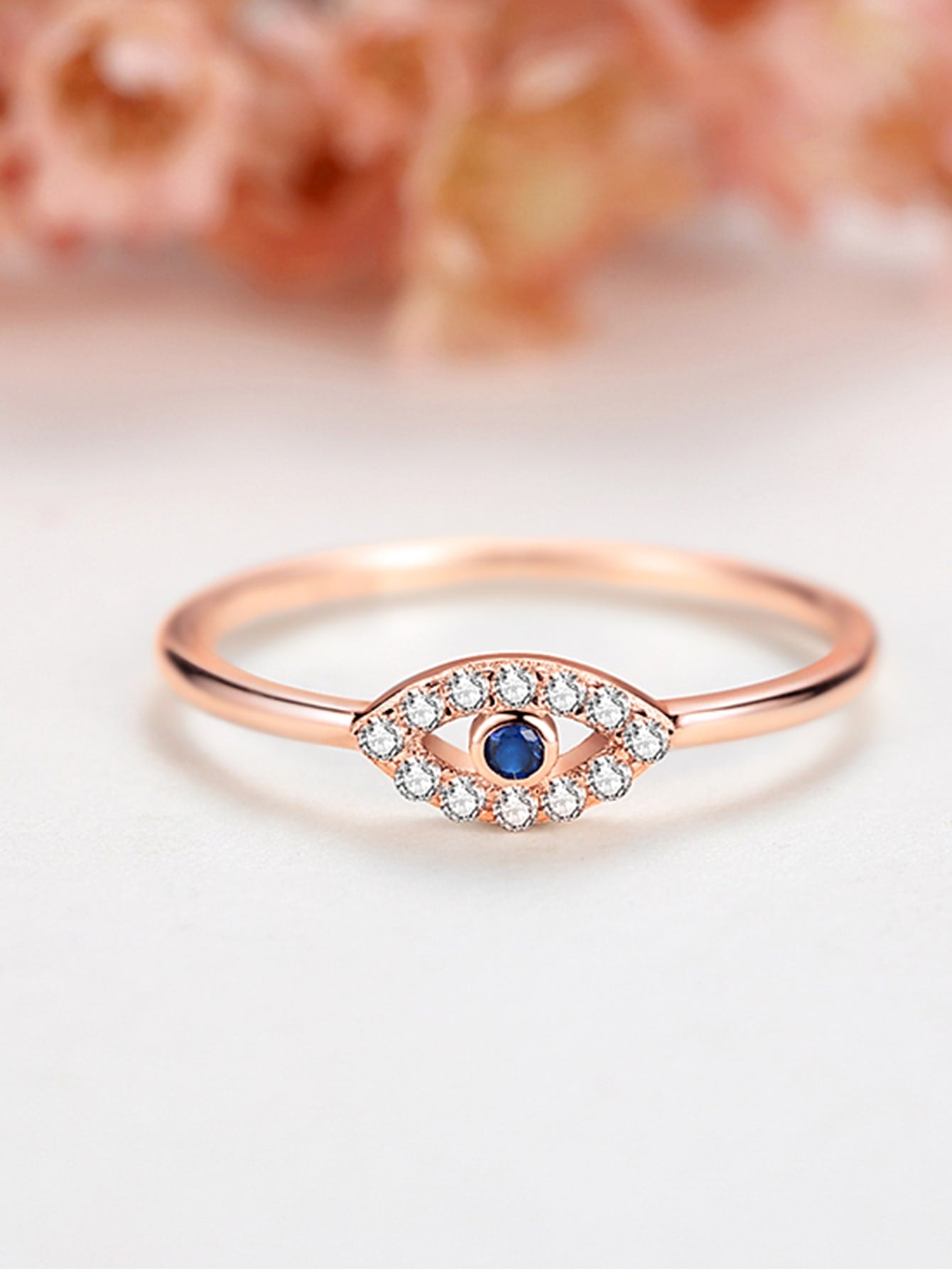 Anillo de Plata con decoración de Ojo Turco y baño en oro rosa de 14kl