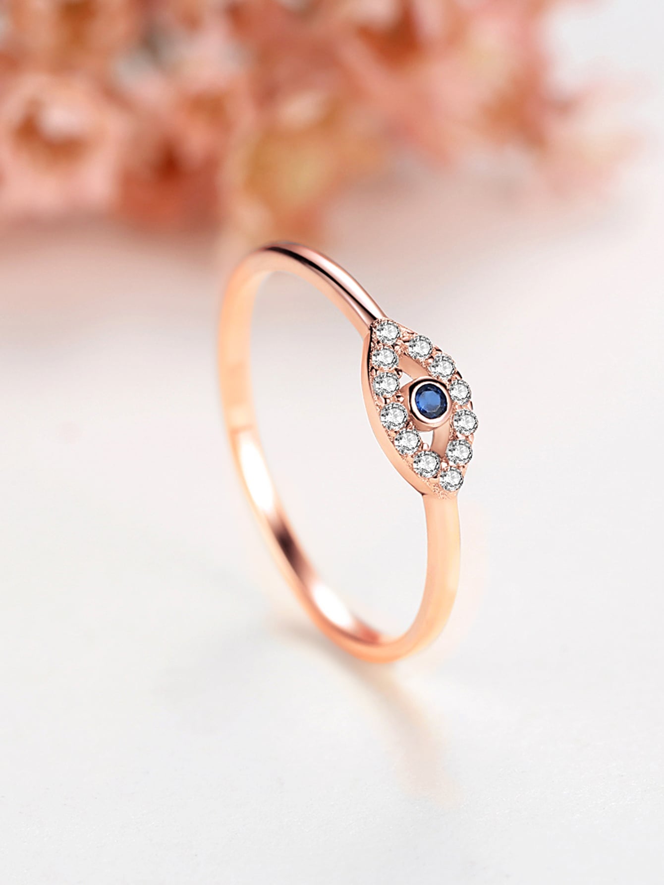 Anillo de Plata con decoración de Ojo Turco y baño en oro rosa de 14kl