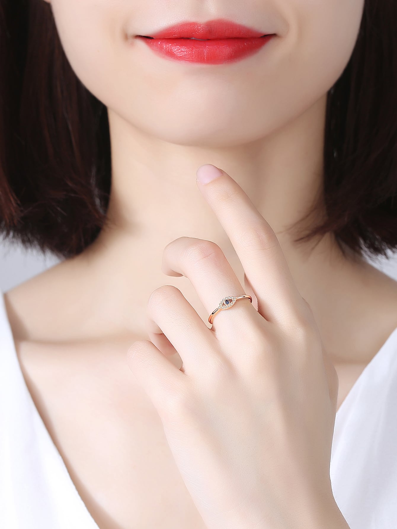 Anillo de Plata con decoración de Ojo Turco y baño en oro rosa de 14kl
