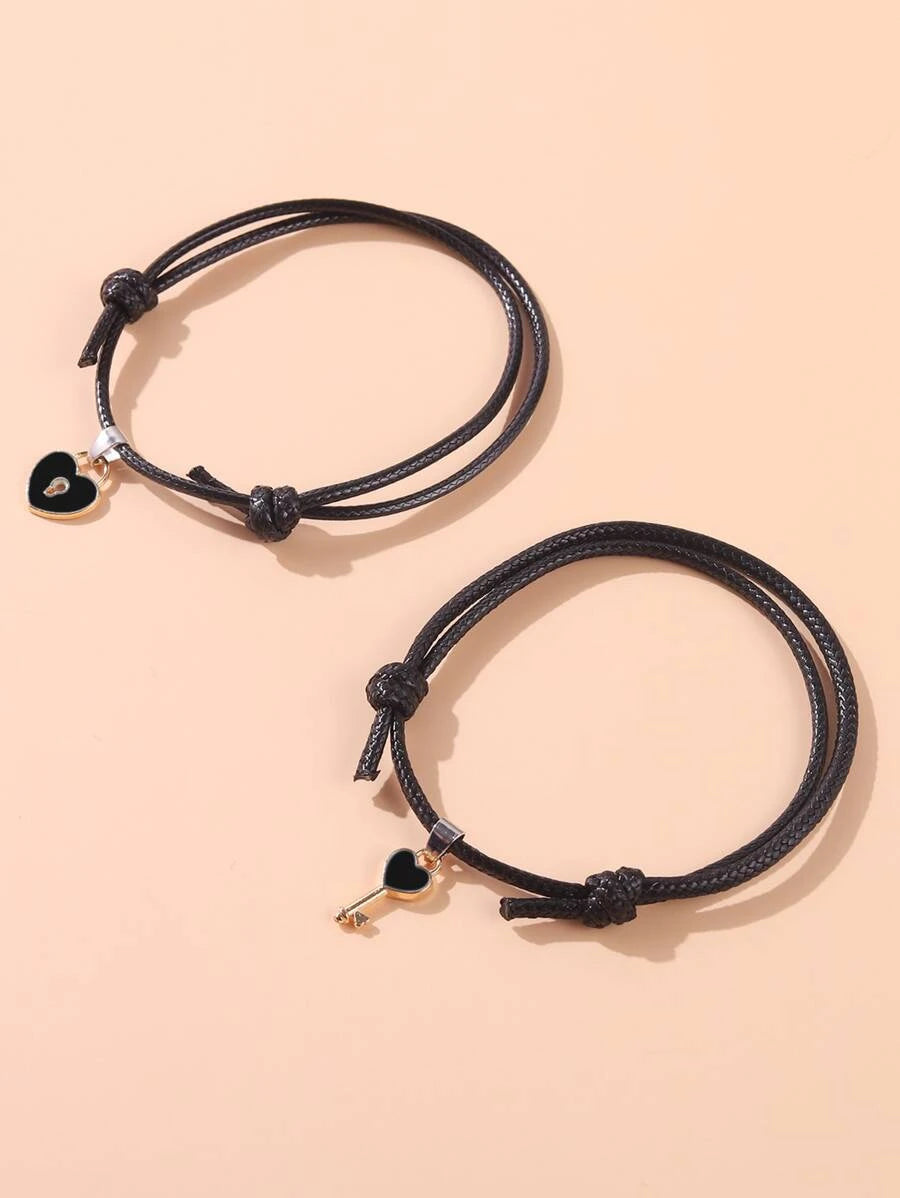 Pulsera de pareja con accesorio de clave y corazón